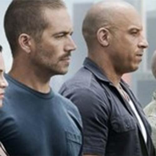 Vin Diesel e Paul Walker em banner de Velozes e Furiosos 7