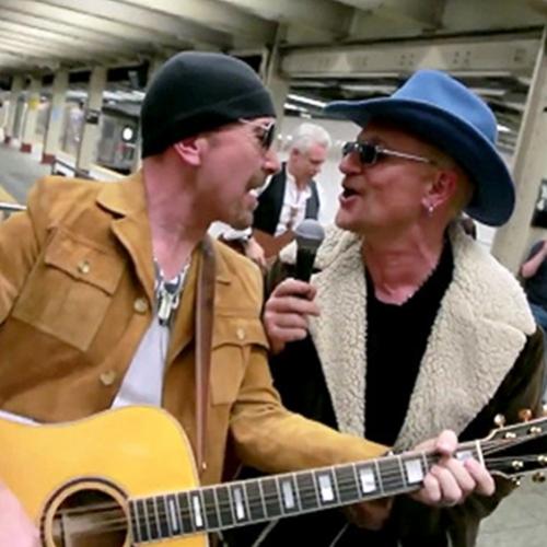 O grupo U2 disfarça-se e toca no metro: a reação das pessoas é