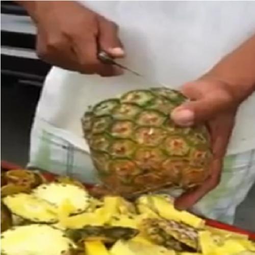 A arte de descascar um abacaxi em segundos! 
